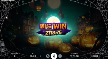 Halloween-themed slot screen with a glowing moon, pumpkins in the foreground, and a bold 'BIG WIN' banner showing 2118.75. Spiderweb borders framing the scene.