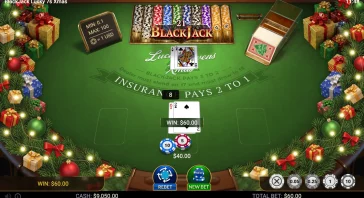 Online blackjack table with Christmas decorations, presents and lights framing the green felt table