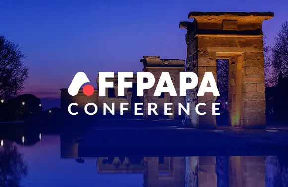 AFFPAPA CONFERENCE logo over an ancient stone gate at dusk, with a blue-purple sky and reflection in water.