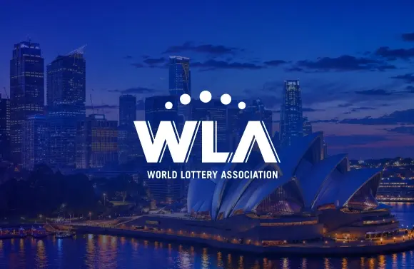 World Lottery Association logo over Sydney Harbour landmarks at dusk with the Opera House and skyline in the background